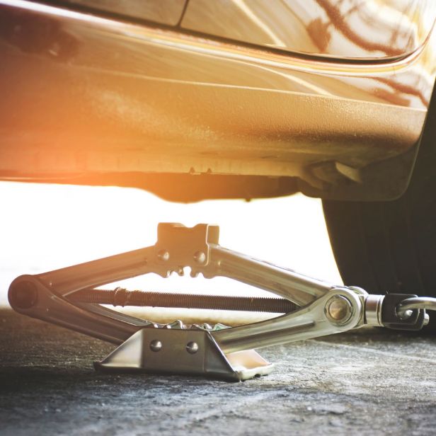 car jack under car