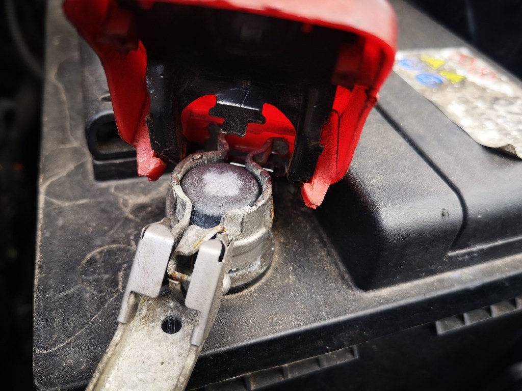 peugeot 208 2015 battery positive terminal cap lifted